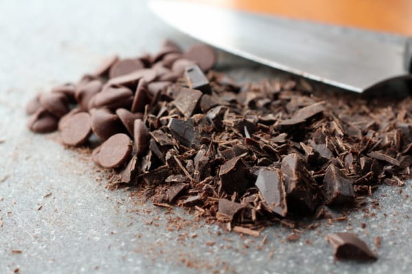 chopping baking chocolate on a cutting board