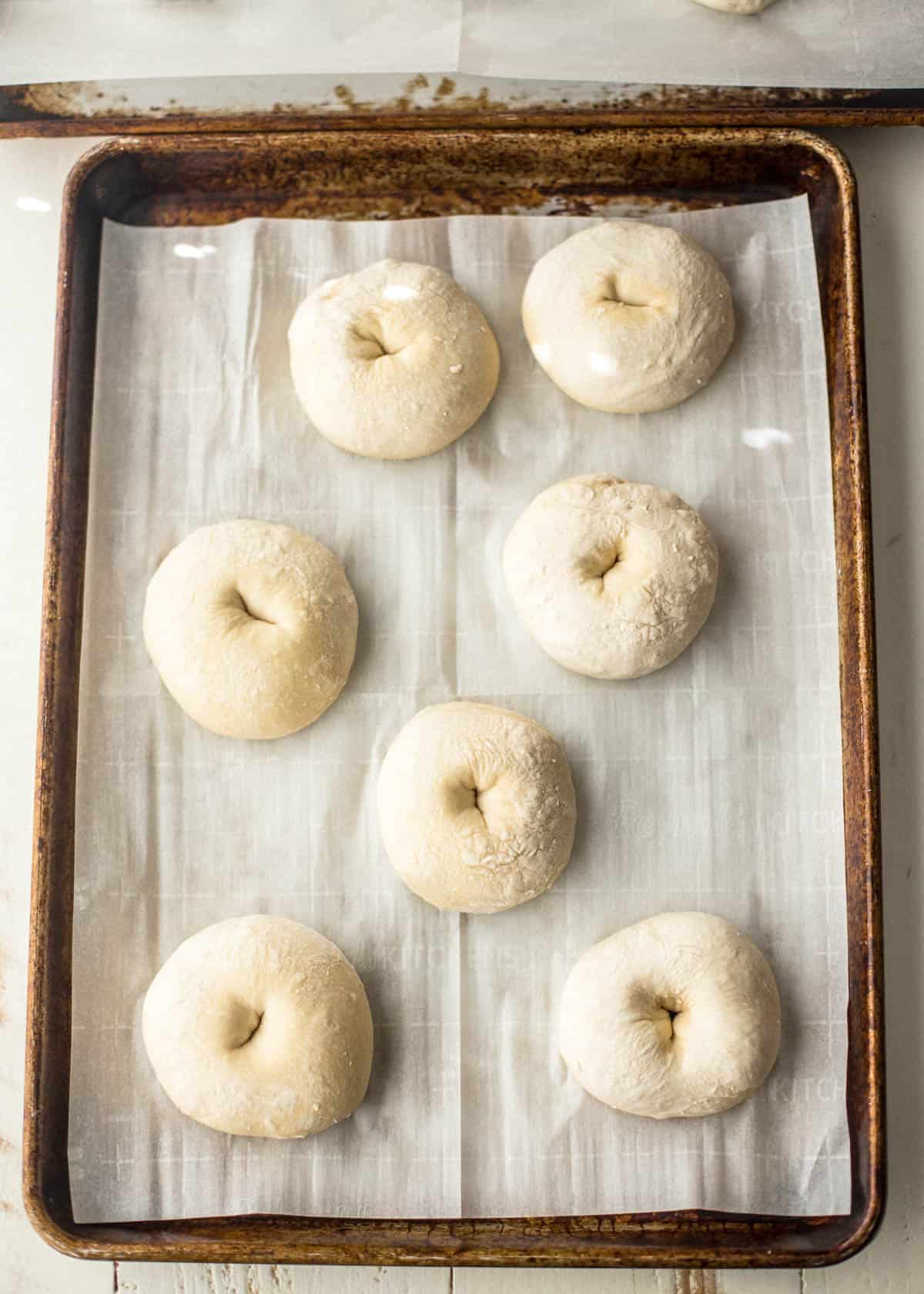 bagels on a parchment lined sheet pan