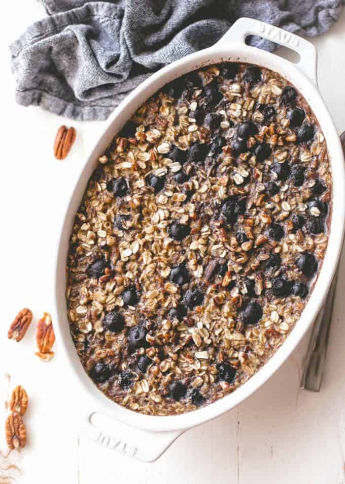 baked blueberry oatmeal in a white baking dish