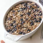 baked blueberry oatmeal in a white baking dish