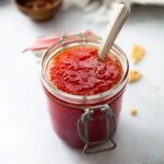 red pepper jelly in a glass jar