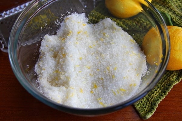 lemon and white sugar in a glass bowl