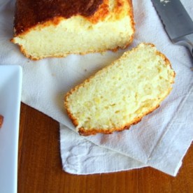 sliced yogurt cake on a white kitchen towel