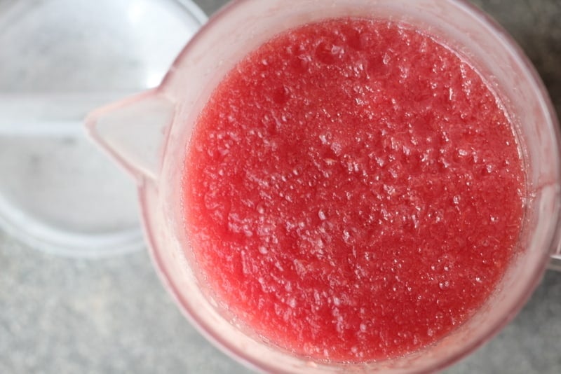 overhead image of watermelon puree in a pitcher