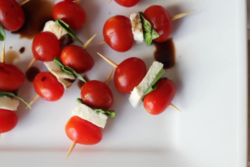 tomatoes and mozzarella a white tray