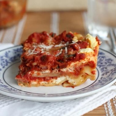 turkey lasagna on a blue and white plate