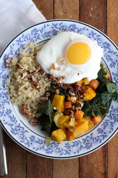 quinoa and vegetables in a blue and white bowl