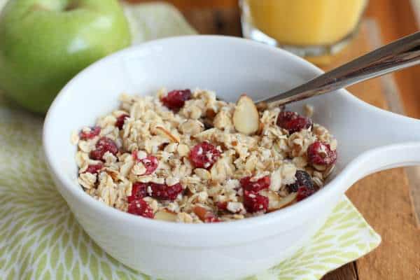 oatmeal with berries in a small white bowl