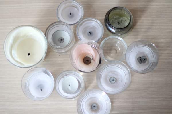 overhead image of empty glass candle holders