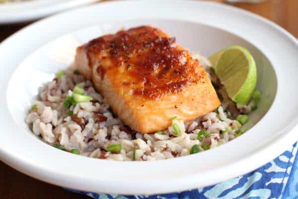 salmon and rice in a white bowl