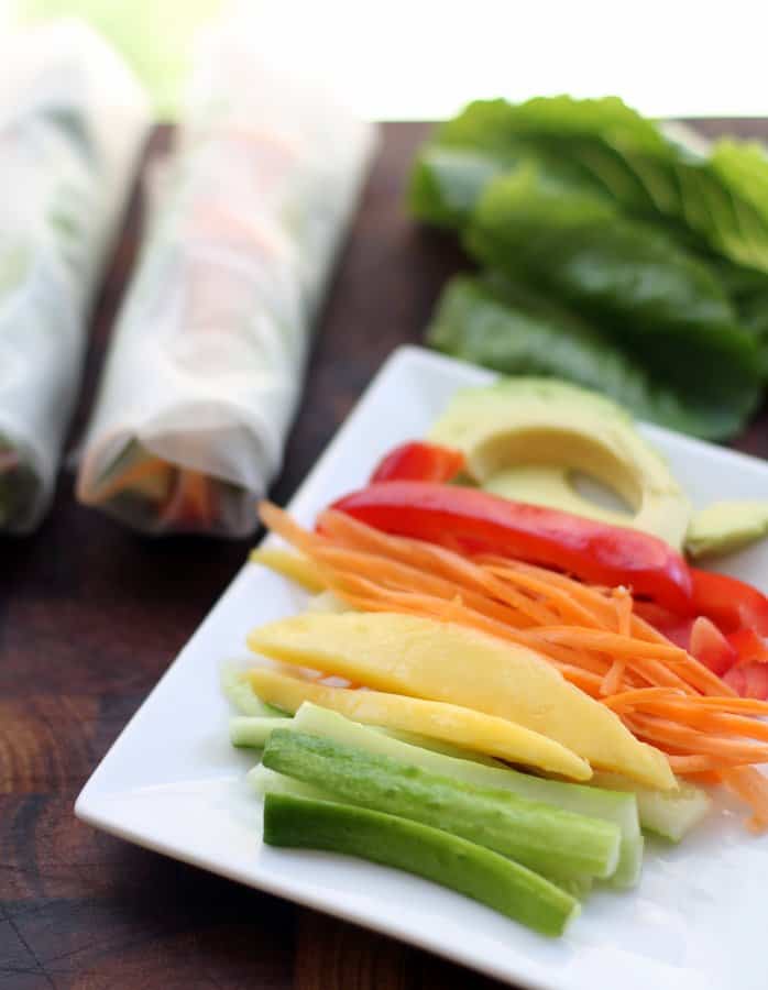 sliced vegetables on a square white plate