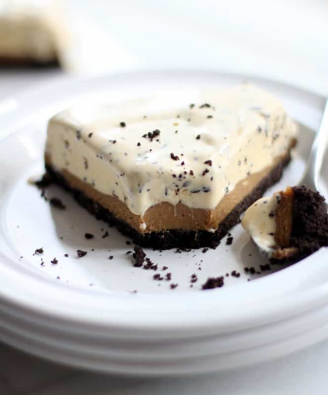 a slice of Ice Cream Cake with a bite taken out of it