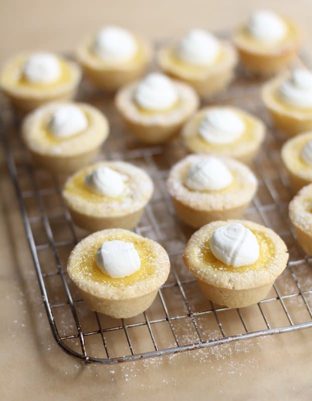 lemon tarts on a cooling rack