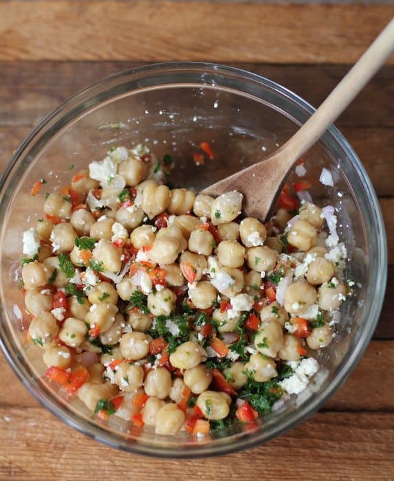 Chickpea and Roasted Red Pepper Salad in a clear bowl