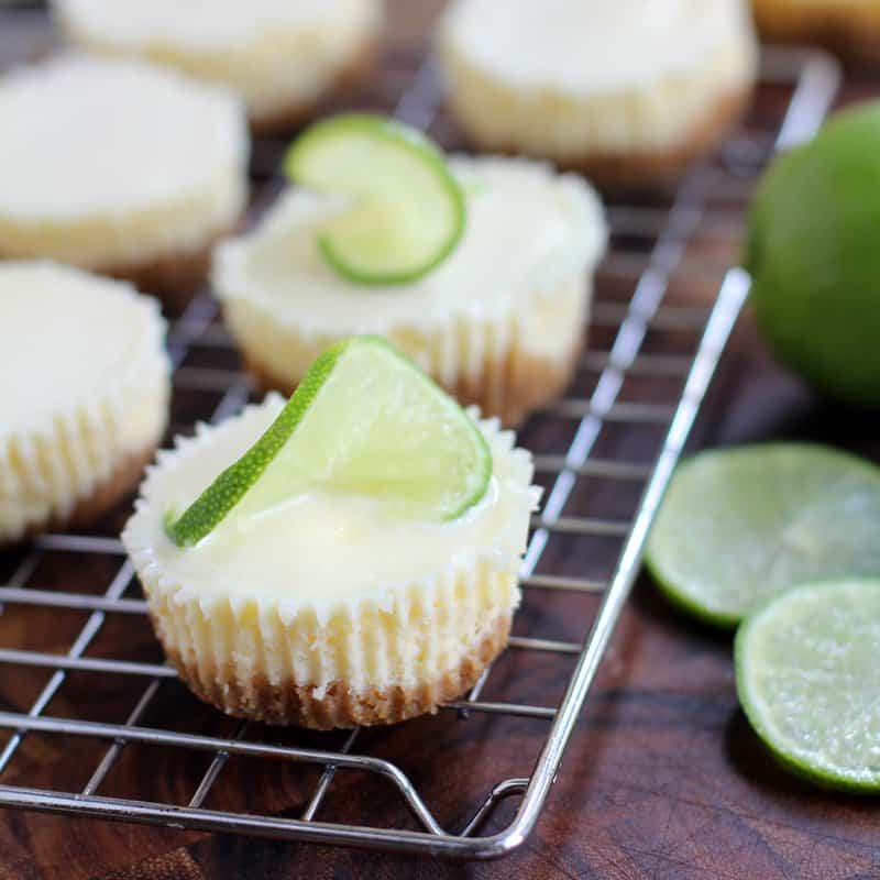 Mini Lime Cheesecakes on a cooling rack