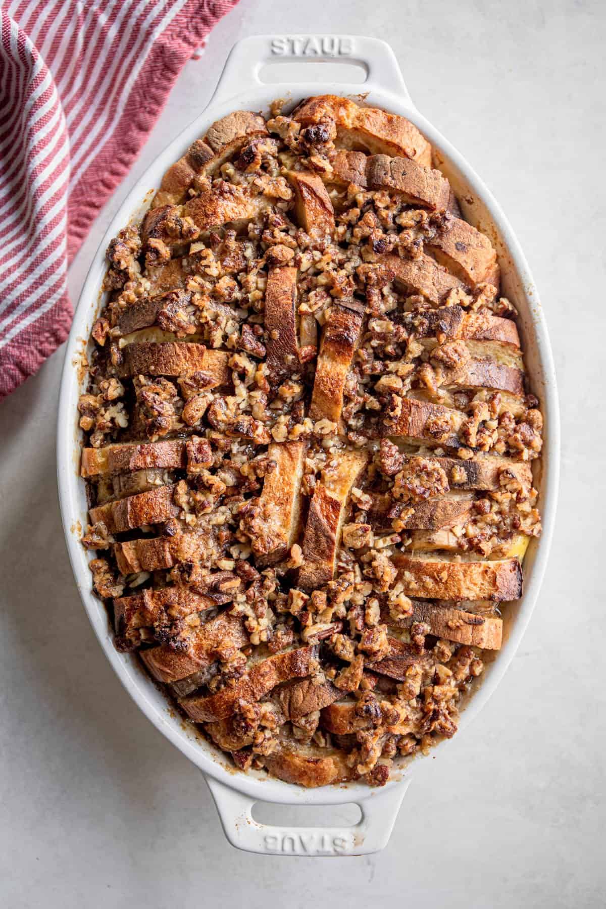 overhead image of baked banana french toast in a casserole dish