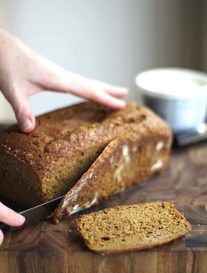 slicing pumpkin bread