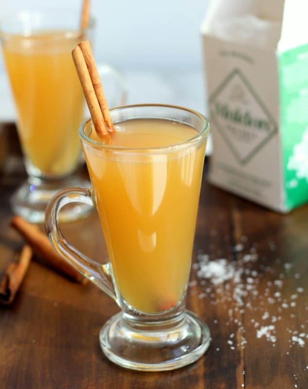 Apple Cider in glasses on a wooden table