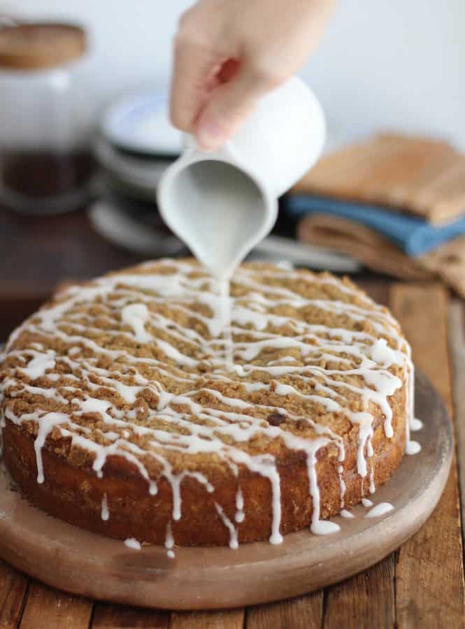 adding icing to coffee cake