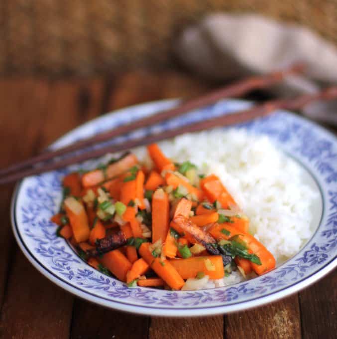 Ginger Scallion Carrots and rice in a blue bowl