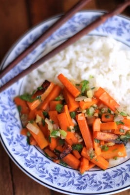 carrots and rice in a blue bowl