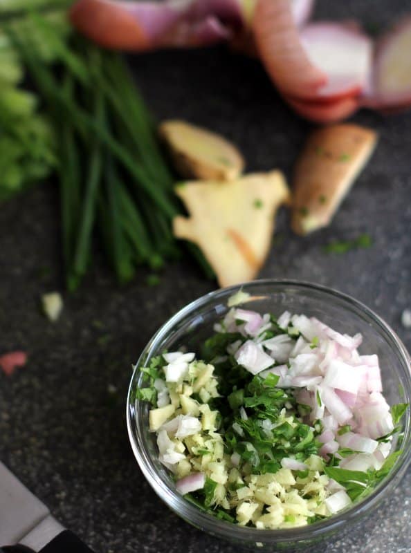 Ginger Scallion Herbs in a clear bowl