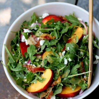 nectarine salad in a white bowl
