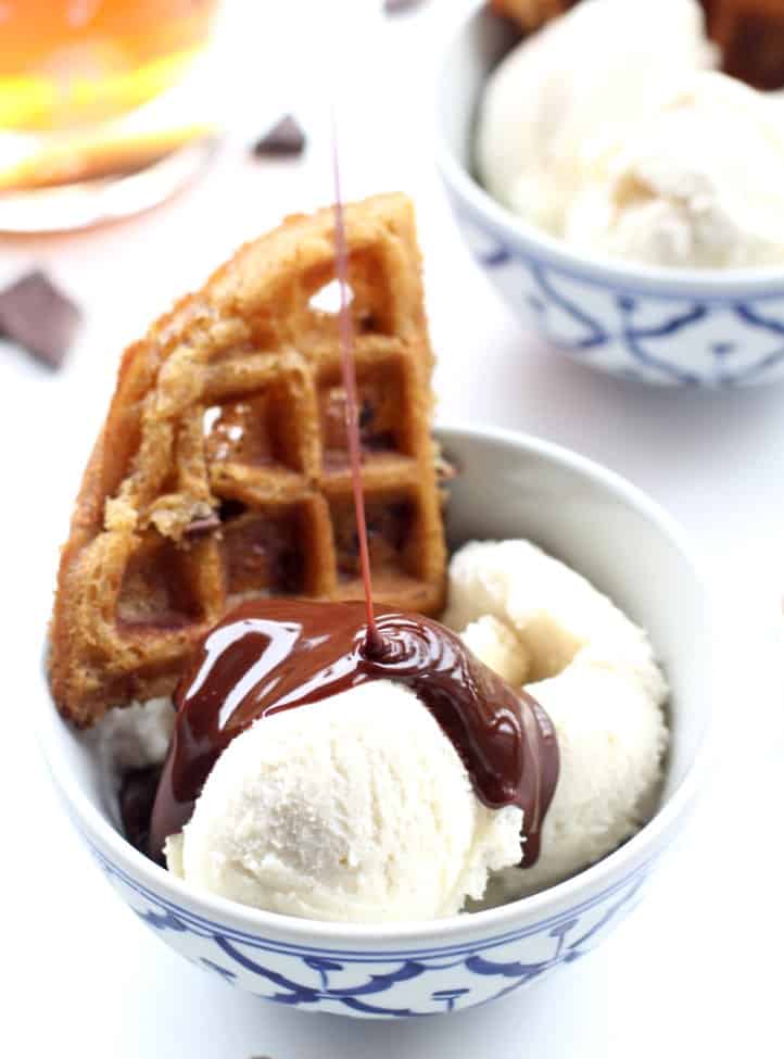 adding bourbon chocolate sauce to ice cream