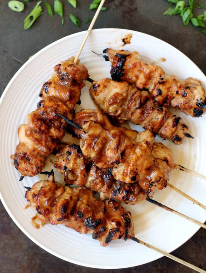 honey garlic Chicken Skewers on a white plate