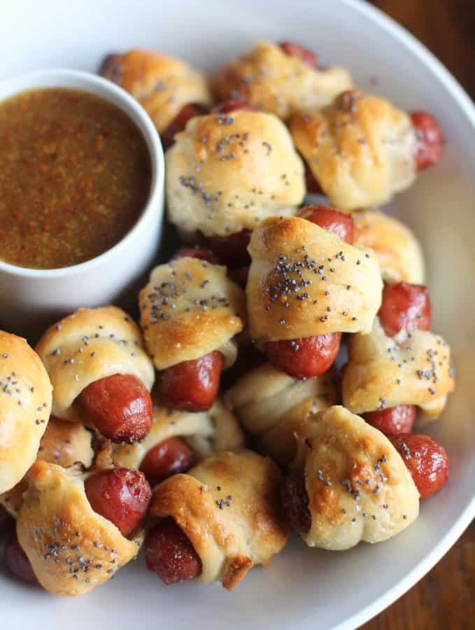 pigs in a blanket on a white plate