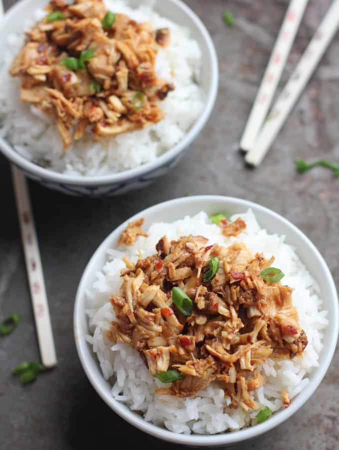 Chicken in bowls over rice