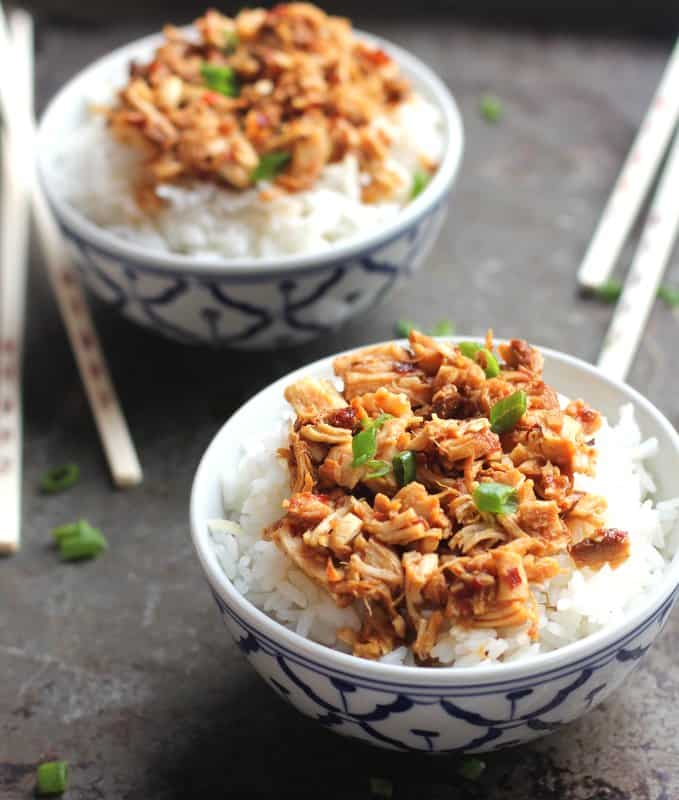 Sweet Chili Chicken over rice in blue and white bowls