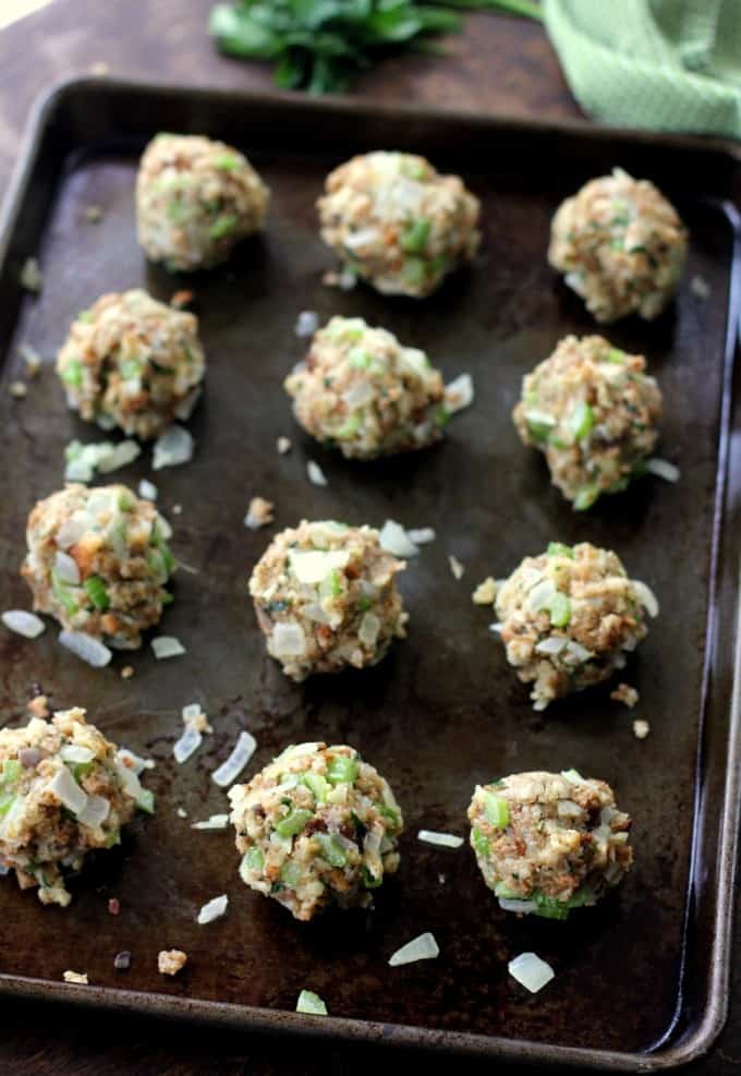 uncooked Stuffing Balls on a sheet pan