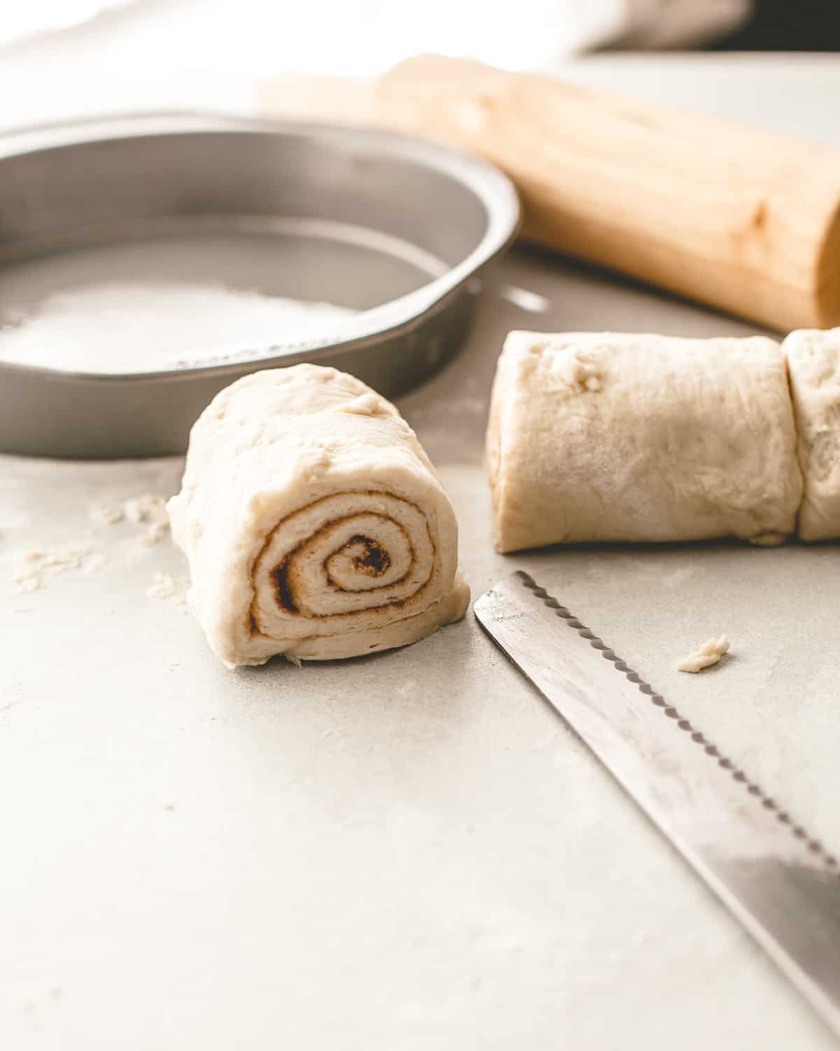 cutting slices of rolled dough