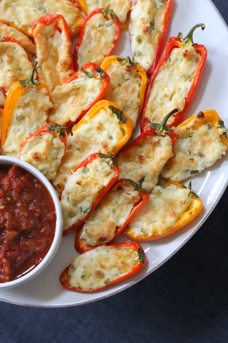 Herb and Cheese Stuffed Sweet Peppers on an appetizer plate 