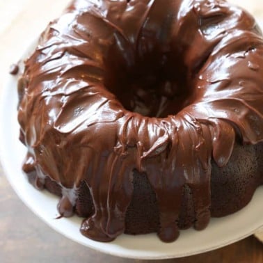 chocolate bundt cake on a white plate