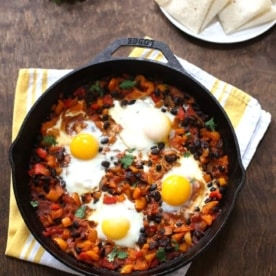 huevos rancheros in a cast iron skillet