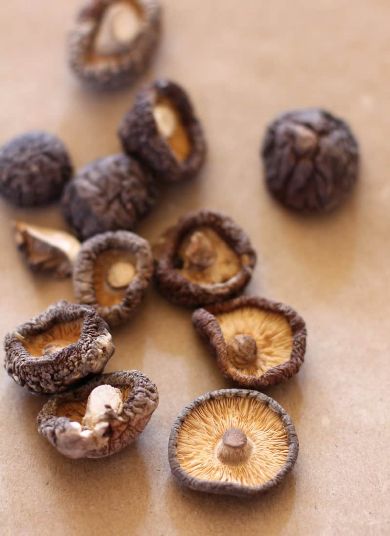 overhead image of Dried Shiitakes on a wooden tray