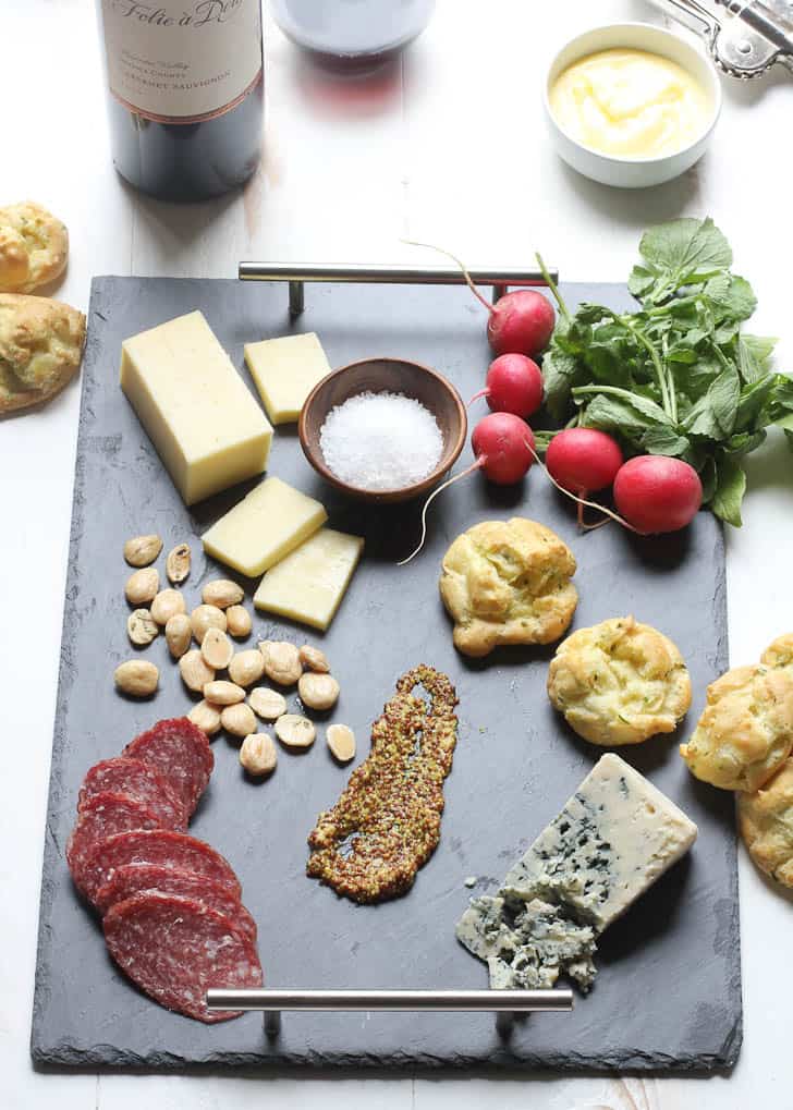 Spring Cheese Board on a white countertop