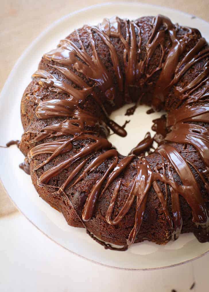 Banana Bread Bundt Cake on a white cake plate