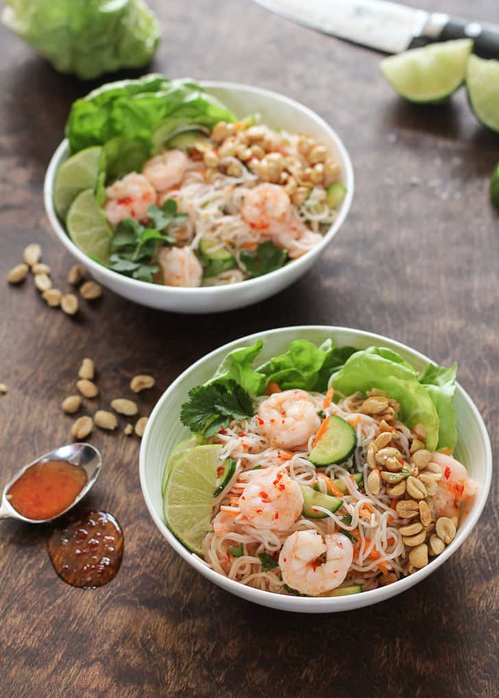 shrimp and rice noodle salad in a white bowl