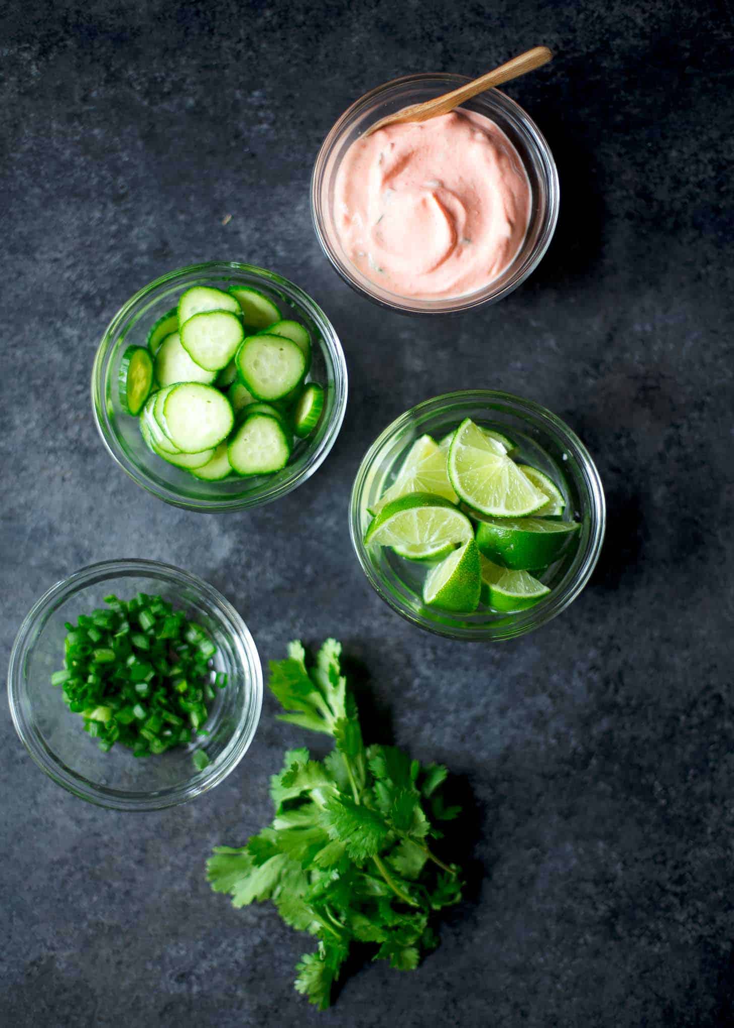 toppings for banh mi burgers on a grey countertop