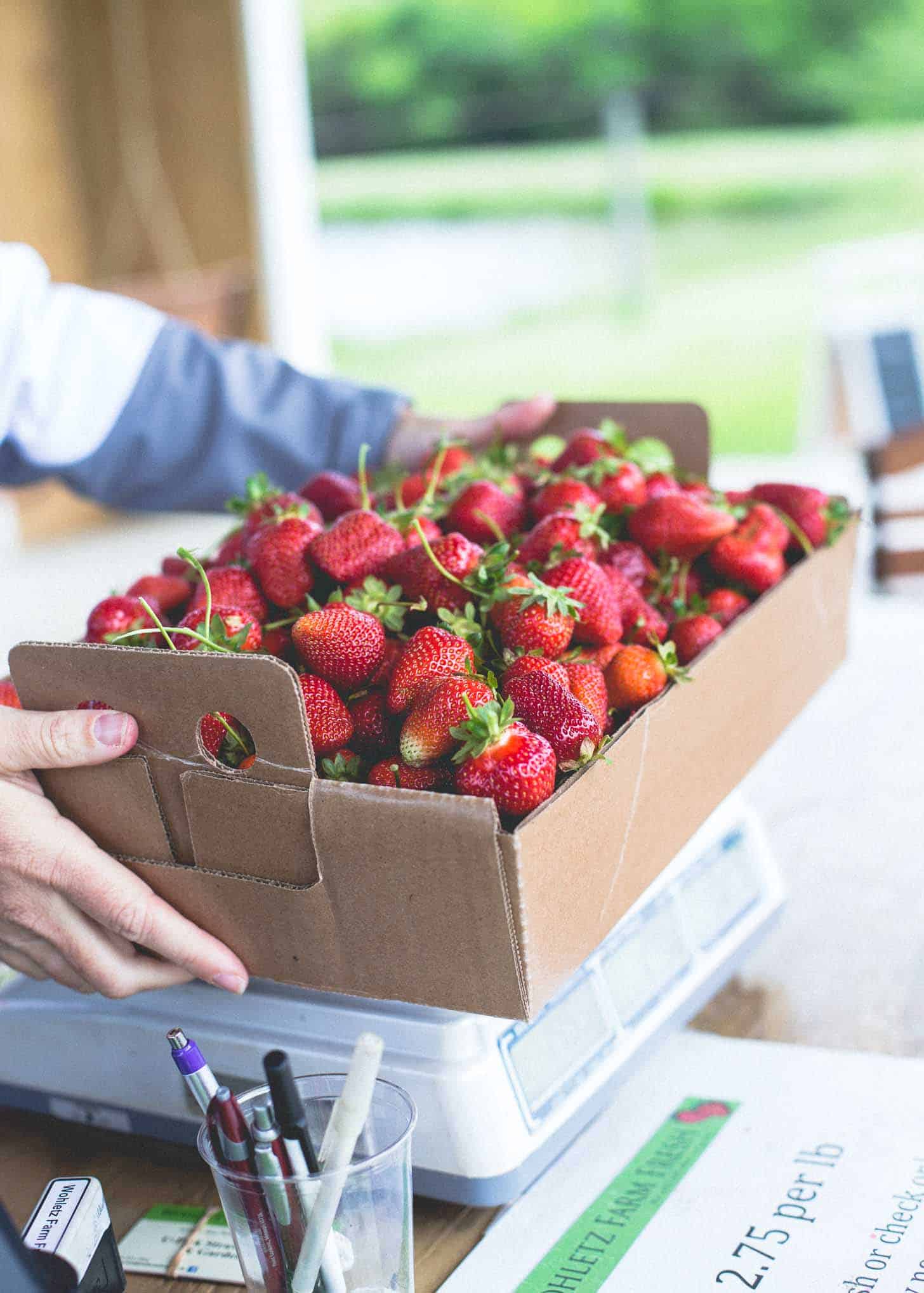 a box of Wohletz Farm Strawberries