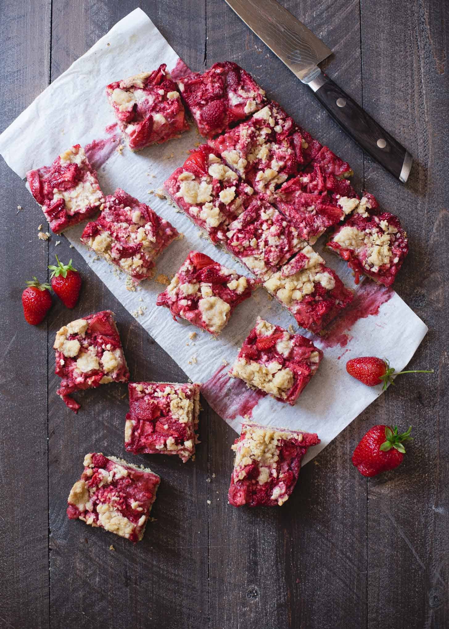 Strawberry Oat Streusel Bars on a wooden table