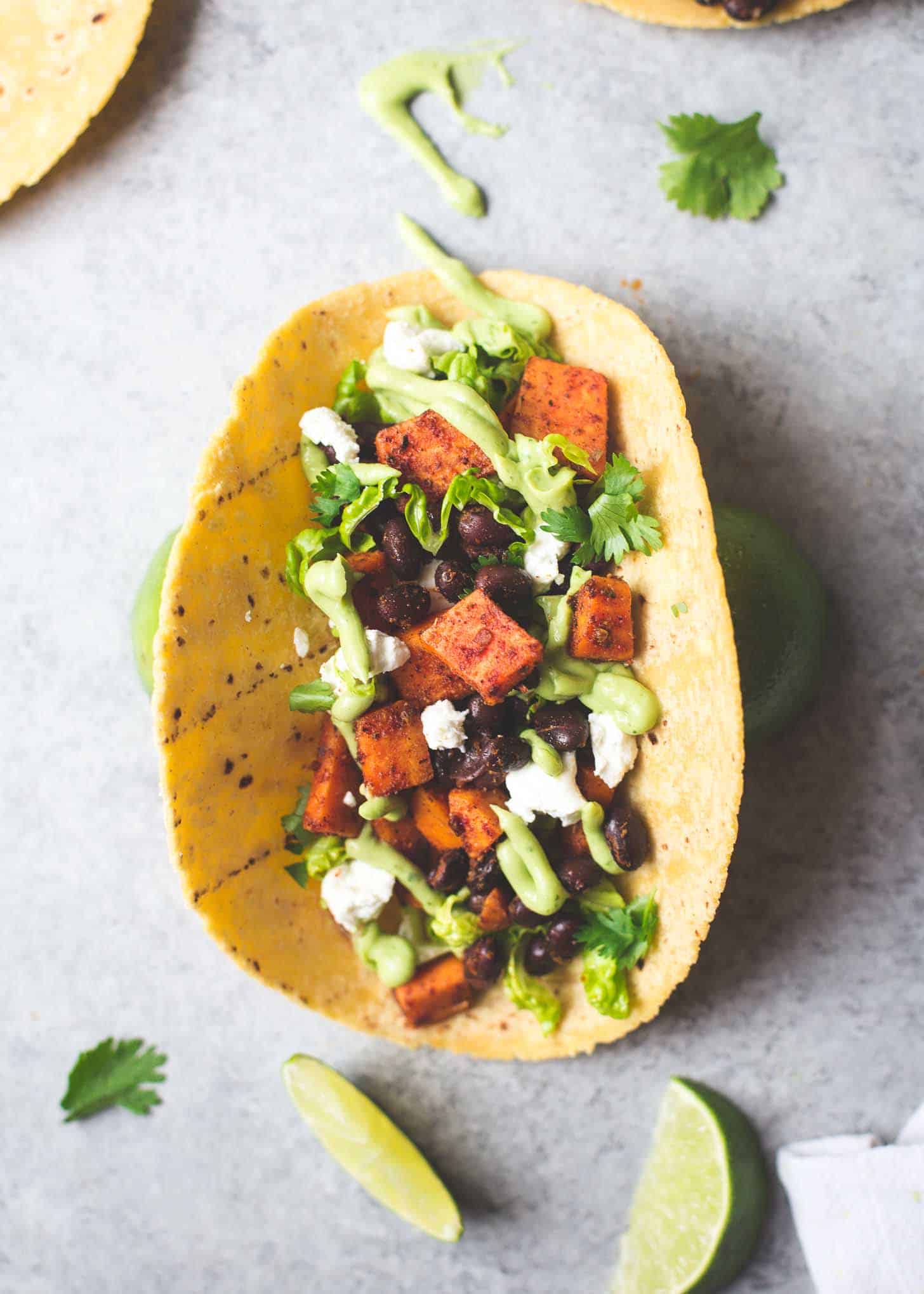 overhead image of sweet potato Taco on a grey table