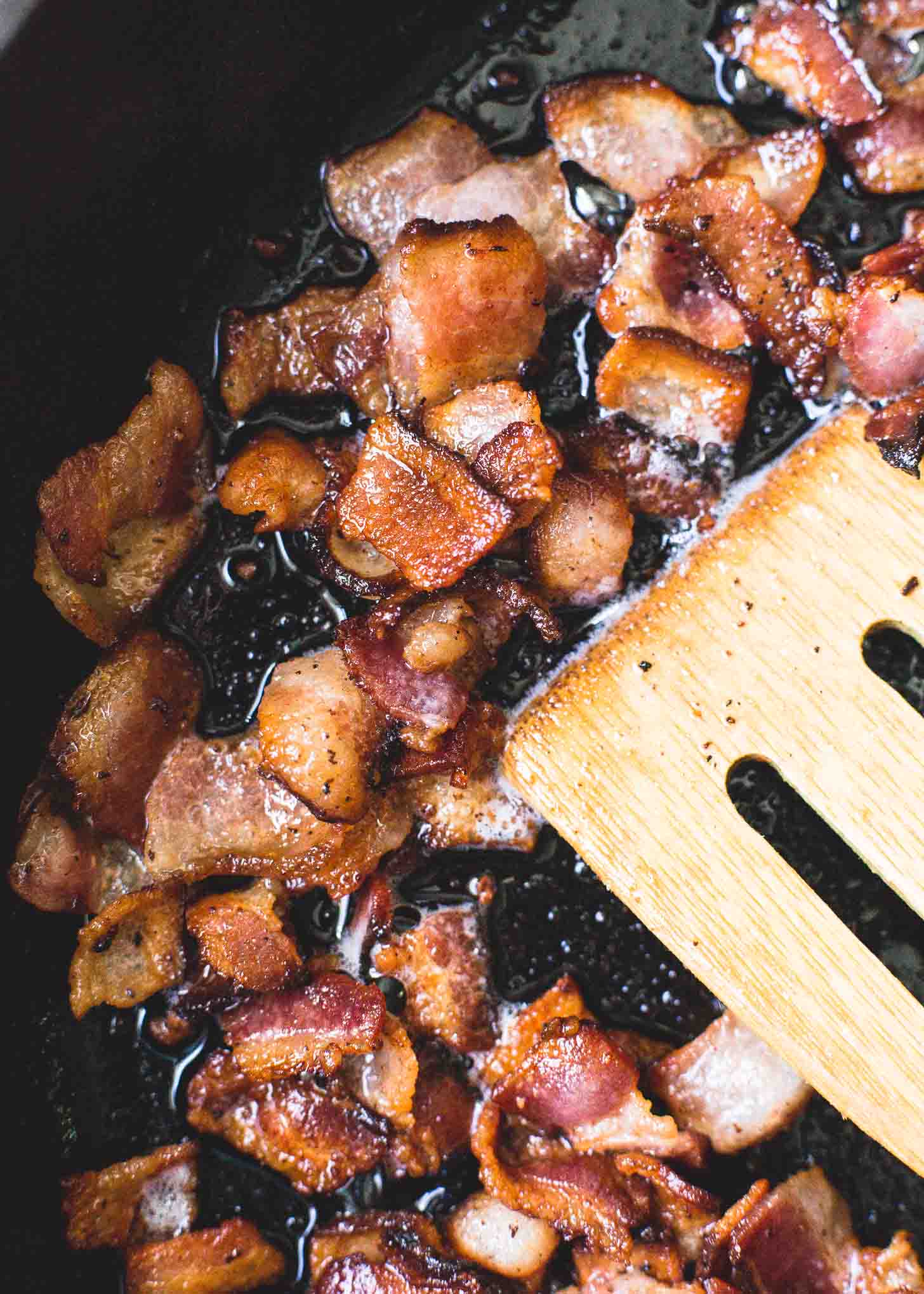 cooking bacon in a cast iron skillet