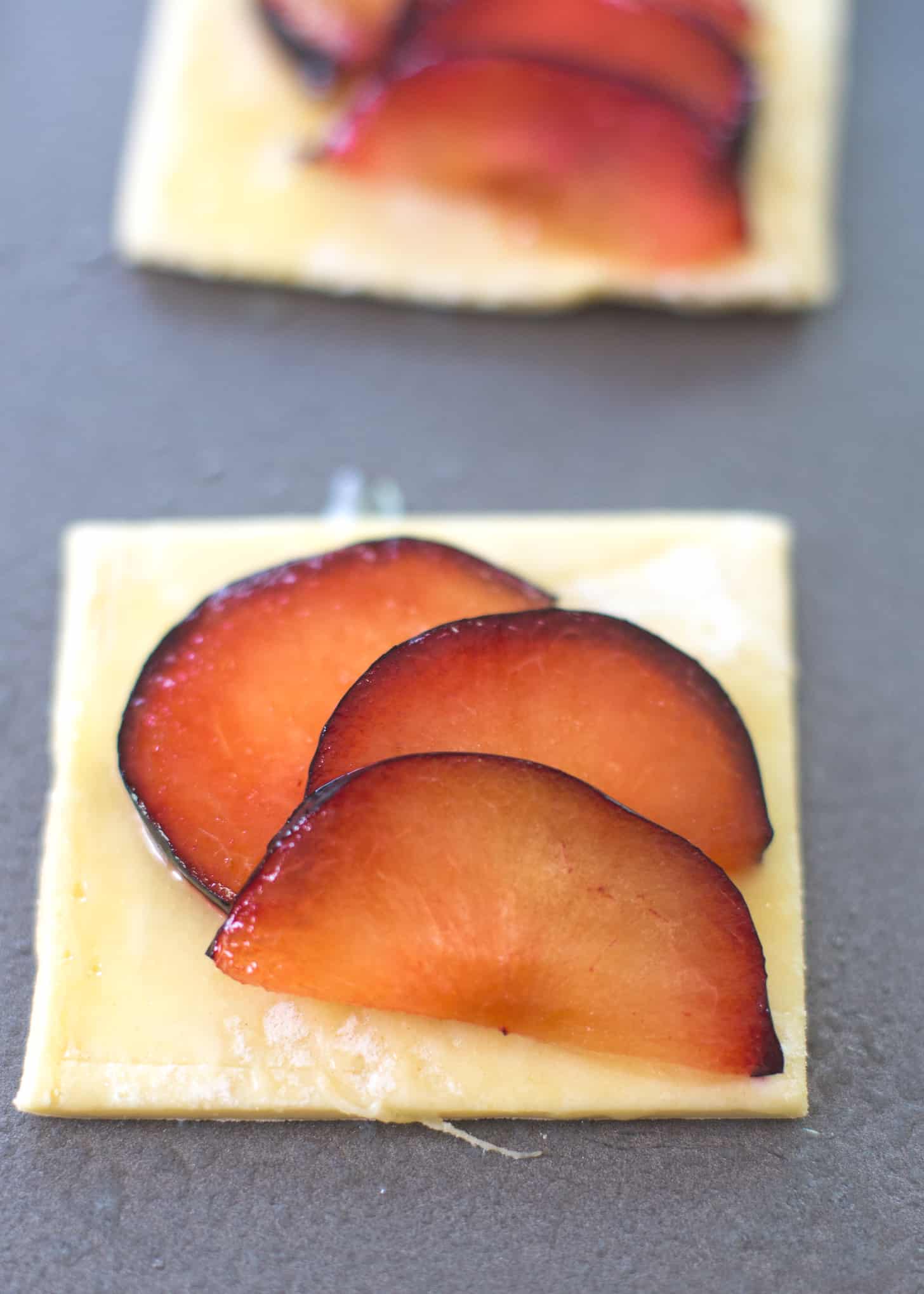 Plum Tarts on a grey tabletop