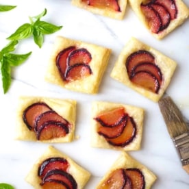 plum tarts on a white countertop