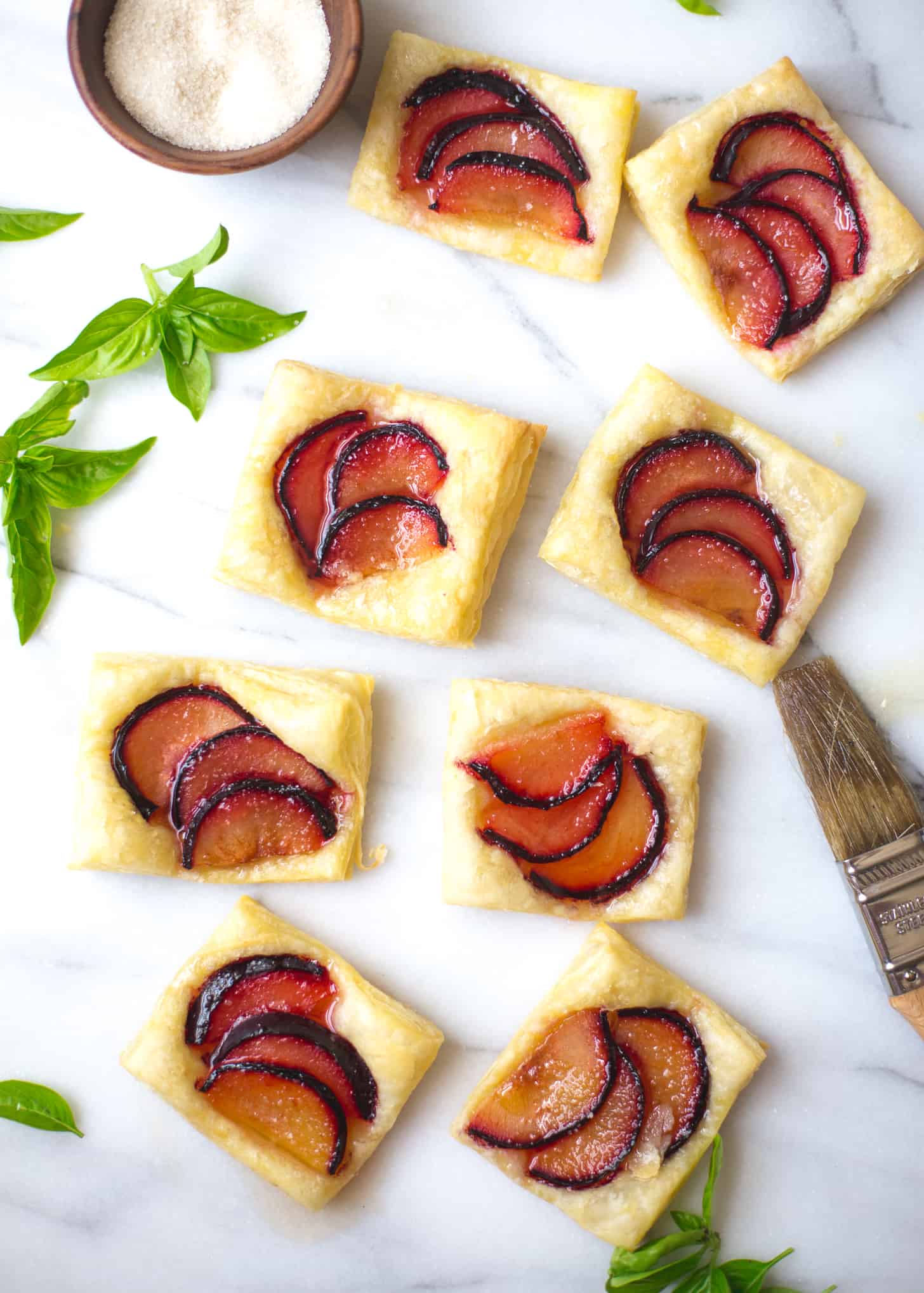 Plum Tarts on a white countertop