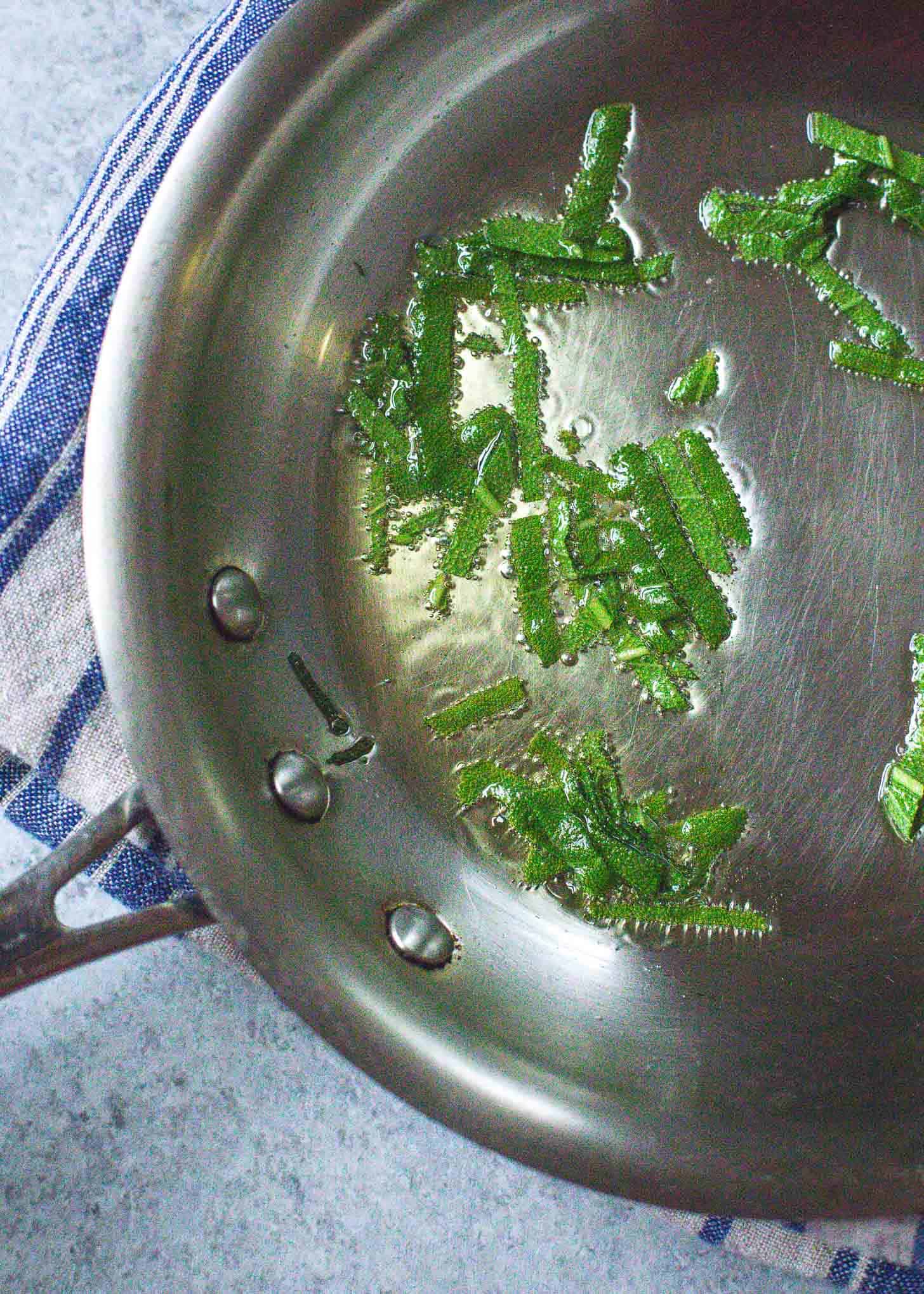 making crispy sage in a skillet